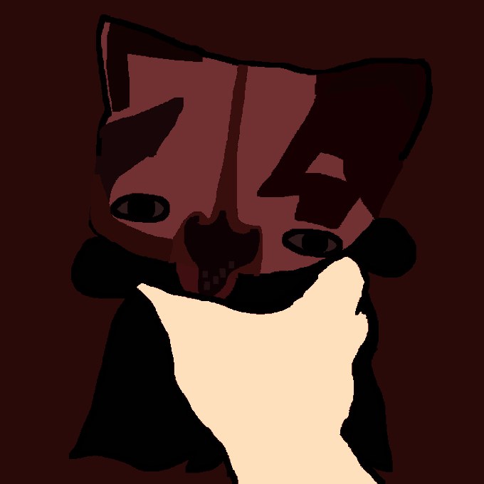 Dark red kitten squeezed by a hand